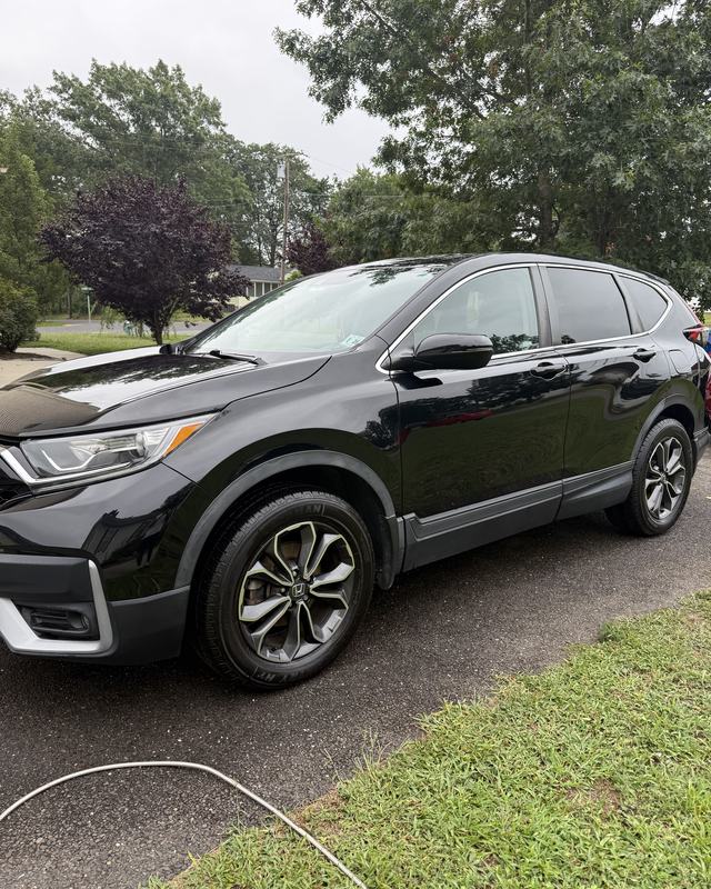 Black Honda CR-V after a hand wash
