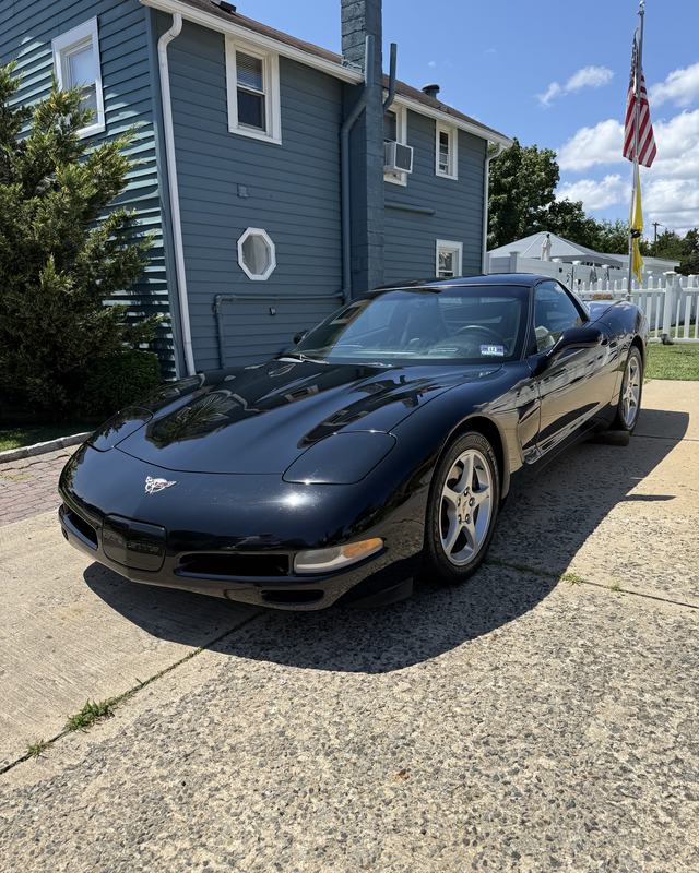 Black Corvette after a hand wash